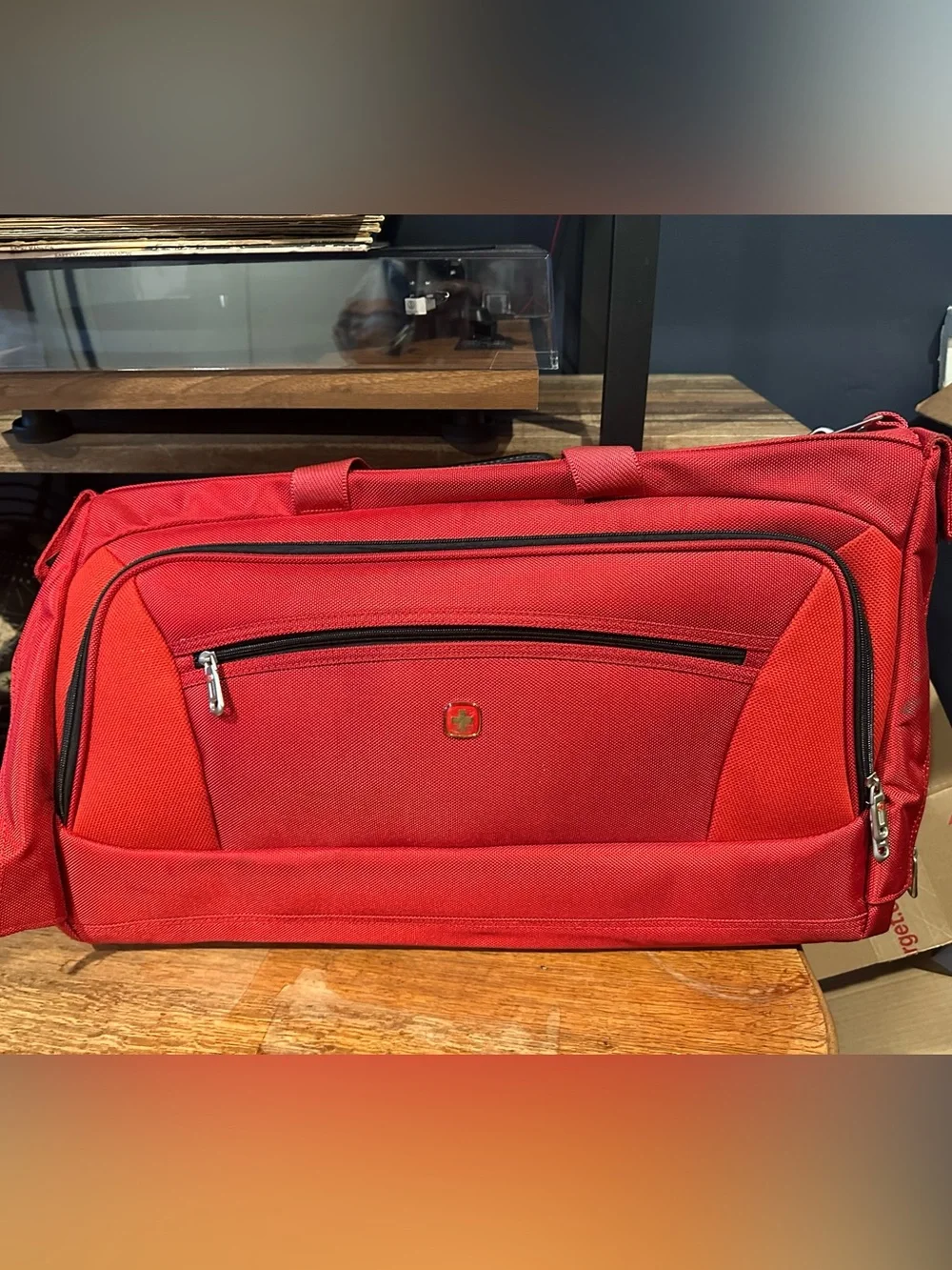 SwissGear Red Garment travel duffel with red lego